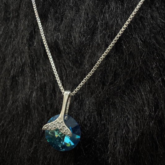A Sterling Silver Pendant with Blue Stone