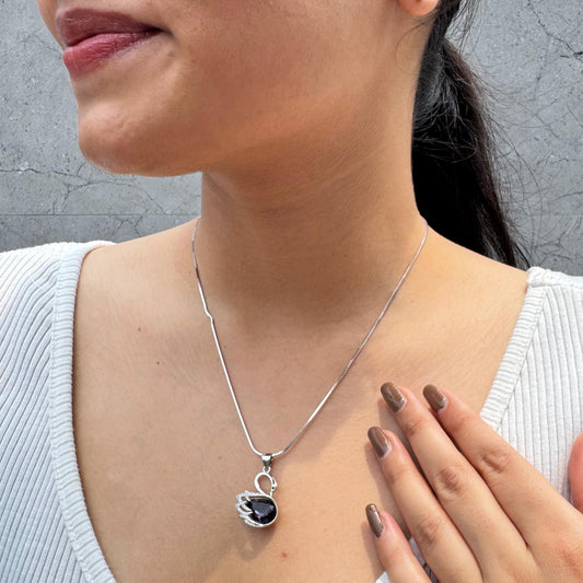 Our Purple Swan necklace on a model